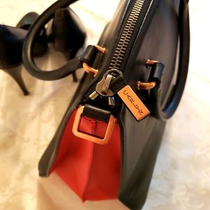 Carlyn two tone leather handbag